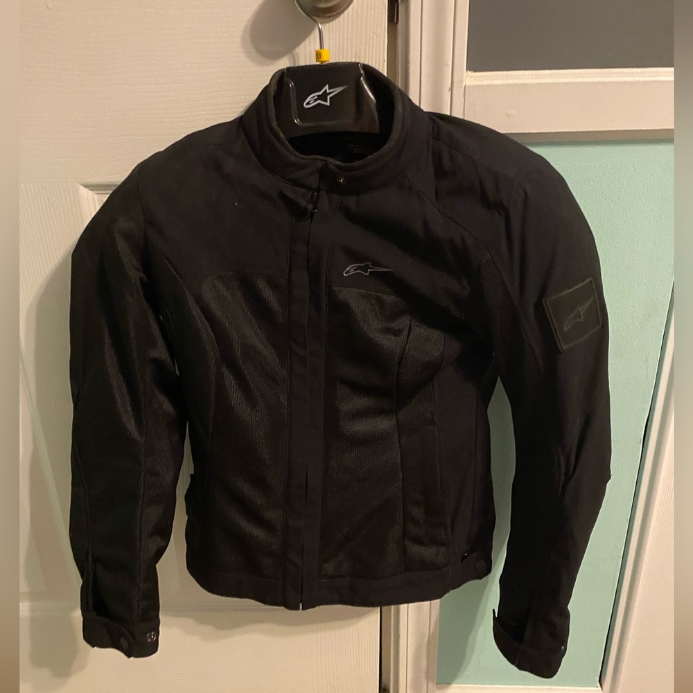 Black Alpinestars motorcycle riding jacket. Hardly worn. Like new.